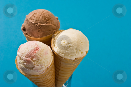 To use this stock image in your creative project, please select the size you need over to the right and click the "Add to Cart" button.
Your downloaded image will come with the Cutcaster watermark removed so don’t worry about the watermark you see on this page. Ice cream stock photo, Food series: chocolate ice cream and vanilla over blue by Gennady Kravetsky