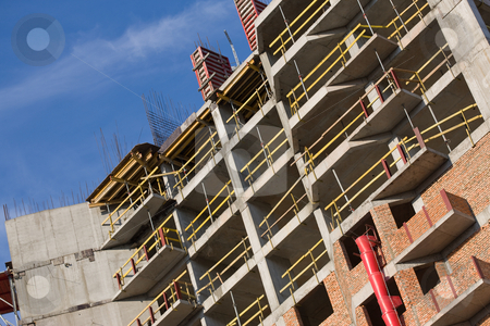 To use this stock image in your creative project, please select the size you need over to the right and click the "Add to Cart" button.
Your downloaded image will come with the Cutcaster watermark removed so don’t worry about the watermark you see on this page. Under construction stock photo, Building series: new city site under construction by Gennady Kravetsky