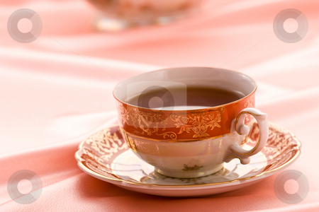 To use this stock image in your creative project, please select the size you need over to the right and click the "Add to Cart" button.
Your downloaded image will come with the Cutcaster watermark removed so don’t worry about the watermark you see on this page. Cup of tea stock photo, Pink still life with cup of tea by Gennady Kravetsky