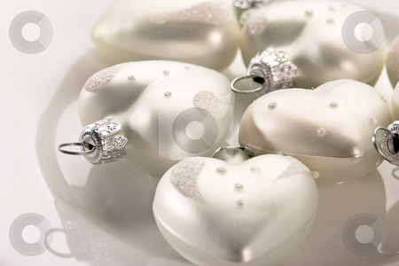To use this stock image in your creative project, please select the size you need over to the right and click the "Add to Cart" button.
Your downloaded image will come with the Cutcaster watermark removed so don’t worry about the watermark you see on this page. Heart stock photo, Holiday series: some hearts over white background by Gennady Kravetsky