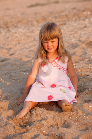To use this stock image in your creative project, please select the size you need over to the right and click the "Add to Cart" button.
Your downloaded image will come with the Cutcaster watermark removed so don’t worry about the watermark you see on this page. Little girl stock photo, People series: little girl on the beach smile by Gennady Kravetsky
