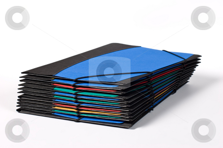 To use this stock image in your creative project, please select the size you need over to the right and click the "Add to Cart" button.
Your downloaded image will come with the Cutcaster watermark removed so don’t worry about the watermark you see on this page. Office folders stock photo, Object series: pile of assorted folders over white by Gennady Kravetsky
