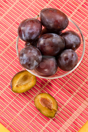 To use this stock image in your creative project, please select the size you need over to the right and click the "Add to Cart" button.
Your downloaded image will come with the Cutcaster watermark removed so don’t worry about the watermark you see on this page. Fresh plum stock photo, Food series: fresh ripe and tasty plum by Gennady Kravetsky
