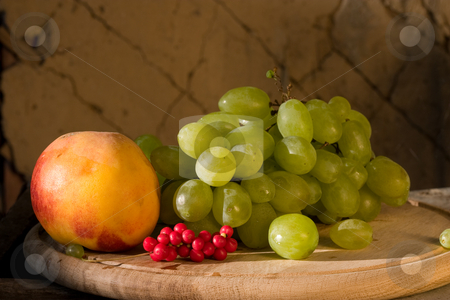 To use this stock image in your creative project, please select the size you need over to the right and click the "Add to Cart" button.
Your downloaded image will come with the Cutcaster watermark removed so don’t worry about the watermark you see on this page. Fruit stock photo, Food series: freshly grown grape, schizandra and peach by Gennady Kravetsky