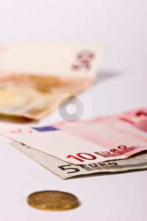 To use this stock image in your creative project, please select the size you need over to the right and click the "Add to Cart" button.
Your downloaded image will come with the Cutcaster watermark removed so don’t worry about the watermark you see on this page. Euro stock photo, Money series: euro and cent coin on the white surface by Gennady Kravetsky