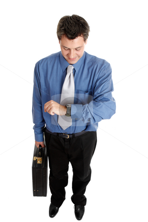 To use this stock image in your creative project, please select the size you need over to the right and click the "Add to Cart" button.
Your downloaded image will come with the Cutcaster watermark removed so don’t worry about the watermark you see on this page. Businessman checking time stock photo, Businessman holding a briefcase checks the time by Leah-Anne Thompson