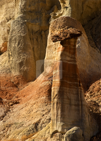 To use this stock image in your creative project, please select the size you need over to the right and click the "Add to Cart" button.
Your downloaded image will come with the Cutcaster watermark removed so don’t worry about the watermark you see on this page. Cocky Hoodoo stock photo, Cocky Hoodoo in the White Rocks area of Utah under laste afternoon light by Mike Dawson