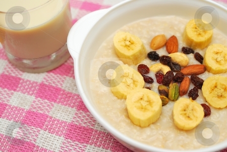 To use this stock image in your creative project, please select the size you need over to the right and click the "Add to Cart" button.
Your downloaded image will come with the Cutcaster watermark removed so don’t worry about the watermark you see on this page. Healthy cereal and soya bean milk stock photo, Cereal and soya bean milk for a healthy and nutritious breakfast. Topped with nuts, raisins and fruit. Suitable for diet and nutrition, healthy eating and lifestyle, and food and beverage concepts. by Wai Chung Tang