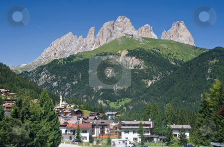 To use this stock image in your creative project, please select the size you need over to the right and click the "Add to Cart" button.
Your downloaded image will come with the Cutcaster watermark removed so don’t worry about the watermark you see on this page. Alba di Canazei, val di Fassa stock photo, Panorama of Alba di Canazei and Fassa valley with Sassolungo mount (Langkofel) behind. Photo taken with polarizer filter by ANTONIO SCARPI