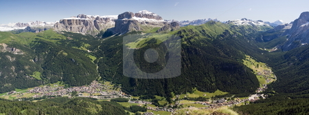To use this stock image in your creative project, please select the size you need over to the right and click the "Add to Cart" button.
Your downloaded image will come with the Cutcaster watermark removed so don’t worry about the watermark you see on this page. Val di Fassa panorama stock photo, Aerial view of Canazei and Fassa valley with Saas Pordoi mount (Sella group), Pordoi pass and Fedaia pass by ANTONIO SCARPI