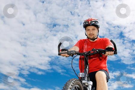 To use this stock image in your creative project, please select the size you need over to the right and click the "Add to Cart" button.
Your downloaded image will come with the Cutcaster watermark removed so don’t worry about the watermark you see on this page. Cyclist on the mountain bike stock photo, Portrait of cyclist on the mountain bike against blue sky by Tatsiana Amelina