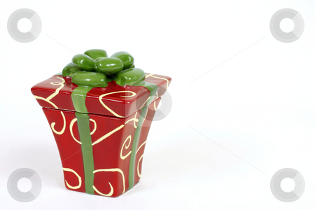 To use this stock image in your creative project, please select the size you need over to the right and click the "Add to Cart" button.
Your downloaded image will come with the Cutcaster watermark removed so don’t worry about the watermark you see on this page. Christmas package present stock photo, Small gift package with space for copy by Leah-Anne Thompson