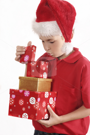 To use this stock image in your creative project, please select the size you need over to the right and click the "Add to Cart" button.
Your downloaded image will come with the Cutcaster watermark removed so don’t worry about the watermark you see on this page. Look Inside stock photo, A child llifts the lid and looks inside a box. by Leah-Anne Thompson
