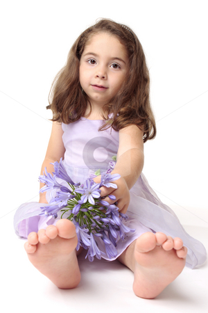 To use this stock image in your creative project, please select the size you need over to the right and click the "Add to Cart" button.
Your downloaded image will come with the Cutcaster watermark removed so don’t worry about the watermark you see on this page. Toddler girl with flowers stock photo, A young toddler girl wearing a pretty dress and sitting on the floor with a large agapanthus flower by Leah-Anne Thompson