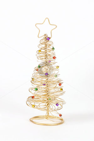 To use this stock image in your creative project, please select the size you need over to the right and click the "Add to Cart" button.
Your downloaded image will come with the Cutcaster watermark removed so don’t worry about the watermark you see on this page. Wire Christmas Tree stock photo, A small golden wire christmas tree by Leah-Anne Thompson