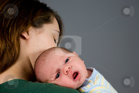 To use this stock image in your creative project, please select the size you need over to the right and click the "Add to Cart" button.
Your downloaded image will come with the Cutcaster watermark removed so don’t worry about the watermark you see on this page. Newborn Baby Boy stock photo, A portrait of a newborn baby boy and his mother. Ten days old. by Travis Manley