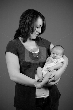 To use this stock image in your creative project, please select the size you need over to the right and click the "Add to Cart" button.
Your downloaded image will come with the Cutcaster watermark removed so don’t worry about the watermark you see on this page. Newborn Baby Boy stock photo, A portrait of a newborn baby boy and his mother. Ten days old. by Travis Manley