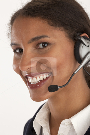 To use this stock image in your creative project, please select the size you need over to the right and click the "Add to Cart" button.
Your downloaded image will come with the Cutcaster watermark removed so don’t worry about the watermark you see on this page. Young Businesswoman with Mobile Device stock photo, Closeup of young businesswoman wearing headset. Vertically framed shot. by Edward Bock