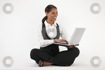 To use this stock image in your creative project, please select the size you need over to the right and click the "Add to Cart" button.
Your downloaded image will come with the Cutcaster watermark removed so don’t worry about the watermark you see on this page. Young Woman Using Laptop stock photo, Young woman sitting on floor using laptop. Horizontally format. by Edward Bock