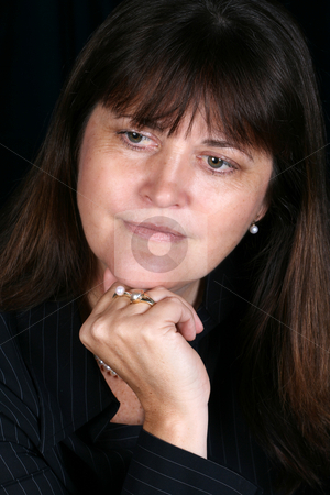 To use this stock image in your creative project, please select the size you need over to the right and click the "Add to Cart" button.
Your downloaded image will come with the Cutcaster watermark removed so don’t worry about the watermark you see on this page. Mature Female stock photo, Beautiful mature brunette female in executive attire by Vanessa Van Rensburg