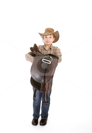 To use this stock image in your creative project, please select the size you need over to the right and click the "Add to Cart" button.
Your downloaded image will come with the Cutcaster watermark removed so don’t worry about the watermark you see on this page. Boy carrying a saddle stock photo, Boy holding a leather saddle in his arms. by Leah-Anne Thompson