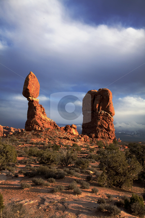 To use this stock image in your creative project, please select the size you need over to the right and click the "Add to Cart" button.
Your downloaded image will come with the Cutcaster watermark removed so don’t worry about the watermark you see on this page. Arches National Park stock photo, View of the red rock formations in Arches National Park with blue sky by Mark Smith