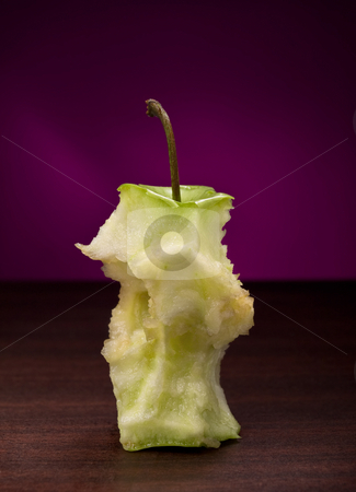 To use this stock image in your creative project, please select the size you need over to the right and click the "Add to Cart" button.
Your downloaded image will come with the Cutcaster watermark removed so don’t worry about the watermark you see on this page. Eaten green apple stock photo, Eaten green apple on the wooden table, closeup shot against purple background by Vladimir Koletic