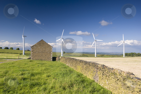 To use this stock image in your creative project, please select the size you need over to the right and click the "Add to Cart" button.
Your downloaded image will come with the Cutcaster watermark removed so don’t worry about the watermark you see on this page. Wind Farm Yorkshire stock photo, Power generation wind farm 35m in height to the hub and have a rotor diameter of 37m by Stephen Meese