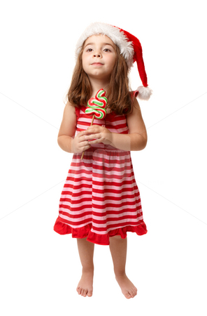 To use this stock image in your creative project, please select the size you need over to the right and click the "Add to Cart" button.
Your downloaded image will come with the Cutcaster watermark removed so don’t worry about the watermark you see on this page. Little girl wearing santa hat and holding Christmas candy stock photo, A small girl wearing a santa hat and holding Christmas candy. by Leah-Anne Thompson