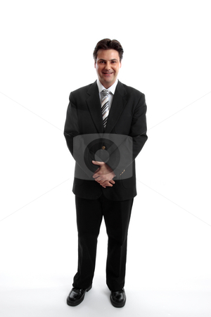To use this stock image in your creative project, please select the size you need over to the right and click the "Add to Cart" button.
Your downloaded image will come with the Cutcaster watermark removed so don’t worry about the watermark you see on this page. Businessman stock photo, Businessman standing on a plain white background. by Leah-Anne Thompson