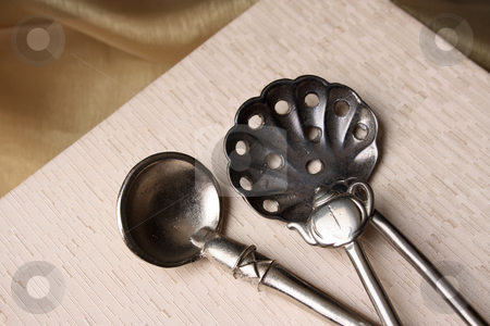 To use this stock image in your creative project, please select the size you need over to the right and click the "Add to Cart" button.
Your downloaded image will come with the Cutcaster watermark removed so don’t worry about the watermark you see on this page. Spoons stock photo, Silver spoons on a cream coloured box background by Vanessa Van Rensburg