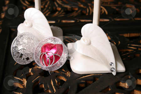 To use this stock image in your creative project, please select the size you need over to the right and click the "Add to Cart" button.
Your downloaded image will come with the Cutcaster watermark removed so don’t worry about the watermark you see on this page. Valentines Proposal stock photo, Decorated long stem glasses with a chocolate heart and rings by Vanessa Van Rensburg