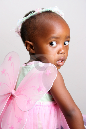 To use this stock image in your creative project, please select the size you need over to the right and click the "Add to Cart" button.
Your downloaded image will come with the Cutcaster watermark removed so don’t worry about the watermark you see on this page. Pink Fairy stock photo, Toddler girl in a pink fairy costume with wings and head piece by Vanessa Van Rensburg