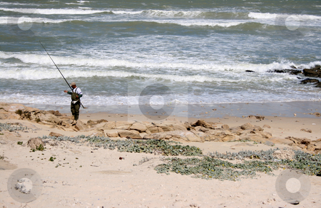 To use this stock image in your creative project, please select the size you need over to the right and click the "Add to Cart" button.
Your downloaded image will come with the Cutcaster watermark removed so don’t worry about the watermark you see on this page. Fisherman on the rocks stock photo, Fisherman on the rocks checking out his equipment by Vanessa Van Rensburg