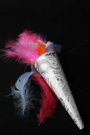 To use this stock image in your creative project, please select the size you need over to the right and click the "Add to Cart" button.
Your downloaded image will come with the Cutcaster watermark removed so don’t worry about the watermark you see on this page. Feather Confetti stock photo, Brightly colored feather confetti in a cone by Vanessa Van Rensburg