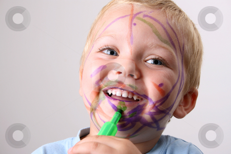To use this stock image in your creative project, please select the size you need over to the right and click the "Add to Cart" button.
Your downloaded image will come with the Cutcaster watermark removed so don’t worry about the watermark you see on this page. Funny Mess stock photo, Laughing Toddler playing with colored pens making a mess by Vanessa Van Rensburg