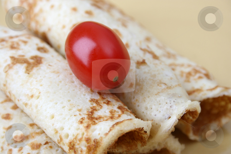 To use this stock image in your creative project, please select the size you need over to the right and click the "Add to Cart" button.
Your downloaded image will come with the Cutcaster watermark removed so don’t worry about the watermark you see on this page. Pancakes and a Tomato stock photo, Close up of pancakes on a yellow plate by Vanessa Van Rensburg