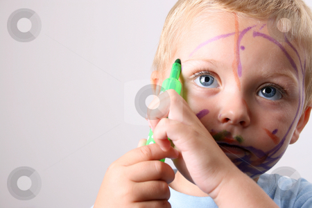 To use this stock image in your creative project, please select the size you need over to the right and click the "Add to Cart" button.
Your downloaded image will come with the Cutcaster watermark removed so don’t worry about the watermark you see on this page. Concentrating stock photo, Laughing Toddler playing with colored pens making a mess by Vanessa Van Rensburg