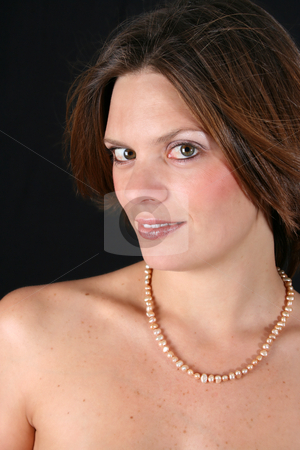 To use this stock image in your creative project, please select the size you need over to the right and click the "Add to Cart" button.
Your downloaded image will come with the Cutcaster watermark removed so don’t worry about the watermark you see on this page. Beautiful Woman stock photo, Beautiful young woman with bare shoulders and pearls by Vanessa Van Rensburg