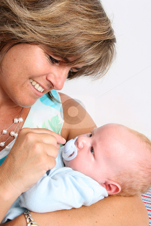 To use this stock image in your creative project, please select the size you need over to the right and click the "Add to Cart" button.
Your downloaded image will come with the Cutcaster watermark removed so don’t worry about the watermark you see on this page. Baby Boy stock photo, Baby boy cuddled by his friendly auntie by Vanessa Van Rensburg