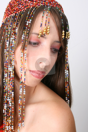To use this stock image in your creative project, please select the size you need over to the right and click the "Add to Cart" button.
Your downloaded image will come with the Cutcaster watermark removed so don’t worry about the watermark you see on this page. Bellydancing Teen stock photo, Beautiful young teenager posing in a belly dance costume by Vanessa Van Rensburg