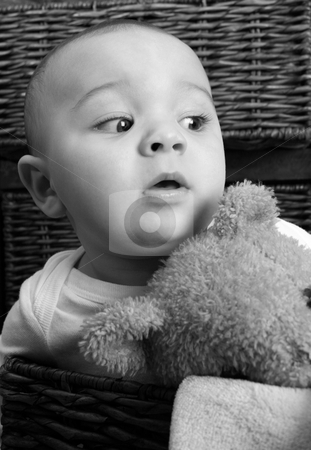 To use this stock image in your creative project, please select the size you need over to the right and click the "Add to Cart" button.
Your downloaded image will come with the Cutcaster watermark removed so don’t worry about the watermark you see on this page. Baby Boy stock photo, Six month old baby sitting infront of wooden drawers by Vanessa Van Rensburg
