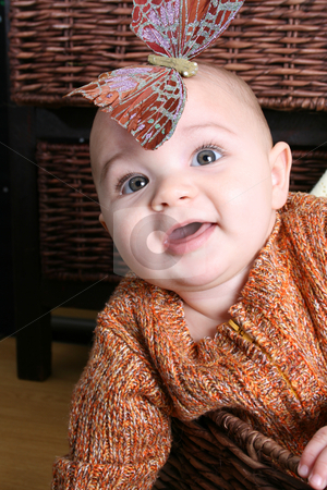 To use this stock image in your creative project, please select the size you need over to the right and click the "Add to Cart" button.
Your downloaded image will come with the Cutcaster watermark removed so don’t worry about the watermark you see on this page. Baby Boy stock photo, Six month old baby sitting infront of wooden drawers by Vanessa Van Rensburg