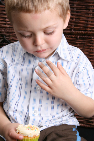 To use this stock image in your creative project, please select the size you need over to the right and click the "Add to Cart" button.
Your downloaded image will come with the Cutcaster watermark removed so don’t worry about the watermark you see on this page. Blond Boy stock photo, Beautiful blond boy eating a vanilla cupcake by Vanessa Van Rensburg