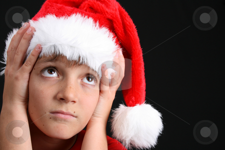 To use this stock image in your creative project, please select the size you need over to the right and click the "Add to Cart" button.
Your downloaded image will come with the Cutcaster watermark removed so don’t worry about the watermark you see on this page. Christmas Boy stock photo, Young boy wearing a red shirt and christmas hat by Vanessa Van Rensburg