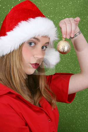 To use this stock image in your creative project, please select the size you need over to the right and click the "Add to Cart" button.
Your downloaded image will come with the Cutcaster watermark removed so don’t worry about the watermark you see on this page. Christmas Teen stock photo, Teenager with red lips wearing a christmas hat by Vanessa Van Rensburg