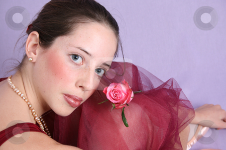 To use this stock image in your creative project, please select the size you need over to the right and click the "Add to Cart" button.
Your downloaded image will come with the Cutcaster watermark removed so don’t worry about the watermark you see on this page. Ballet Girl stock photo, Teenage ballet dancer in a burgundy costume by Vanessa Van Rensburg