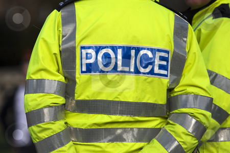 To use this stock image in your creative project, please select the size you need over to the right and click the "Add to Cart" button.
Your downloaded image will come with the Cutcaster watermark removed so don’t worry about the watermark you see on this page. Police stock photo, Shot of the back of a police officer's jacket with the word police written across the back by Darren Pattterson