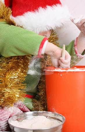 To use this stock image in your creative project, please select the size you need over to the right and click the "Add to Cart" button.
Your downloaded image will come with the Cutcaster watermark removed so don’t worry about the watermark you see on this page. Baking Christmas Cookies stock photo, Toddler wearing a christmas hat, baking christmas cookies by Vanessa Van Rensburg