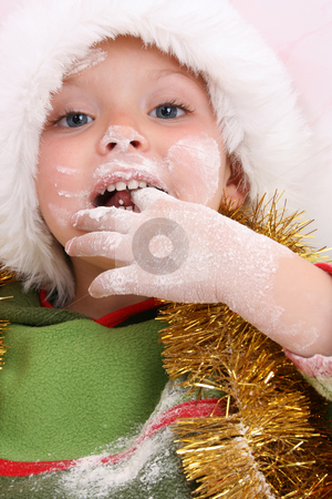 To use this stock image in your creative project, please select the size you need over to the right and click the "Add to Cart" button.
Your downloaded image will come with the Cutcaster watermark removed so don’t worry about the watermark you see on this page. Baking Christmas Cookies stock photo, Toddler wearing a christmas hat, baking christmas cookies by Vanessa Van Rensburg
